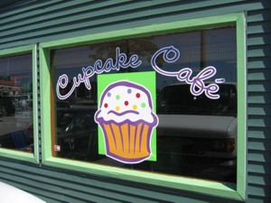 Window vinyl lettering & graphics for Cupcake Cafe. To see more window & door lettering & graphics like this, CLICK HERE to view the window & door lettering & graphics section of our Portfolio page.